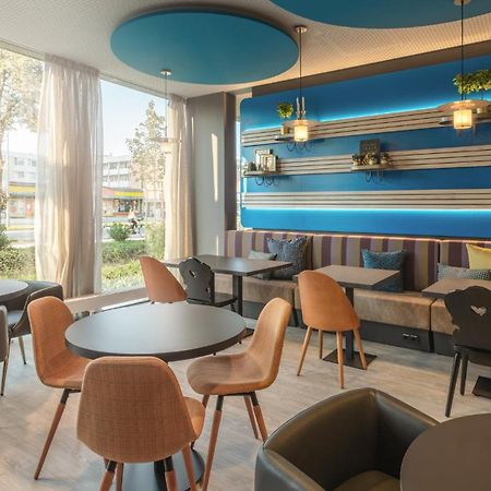 Holiday Inn - The Niu, Brass Munich Olympiapark By Ihg Bagian luar foto